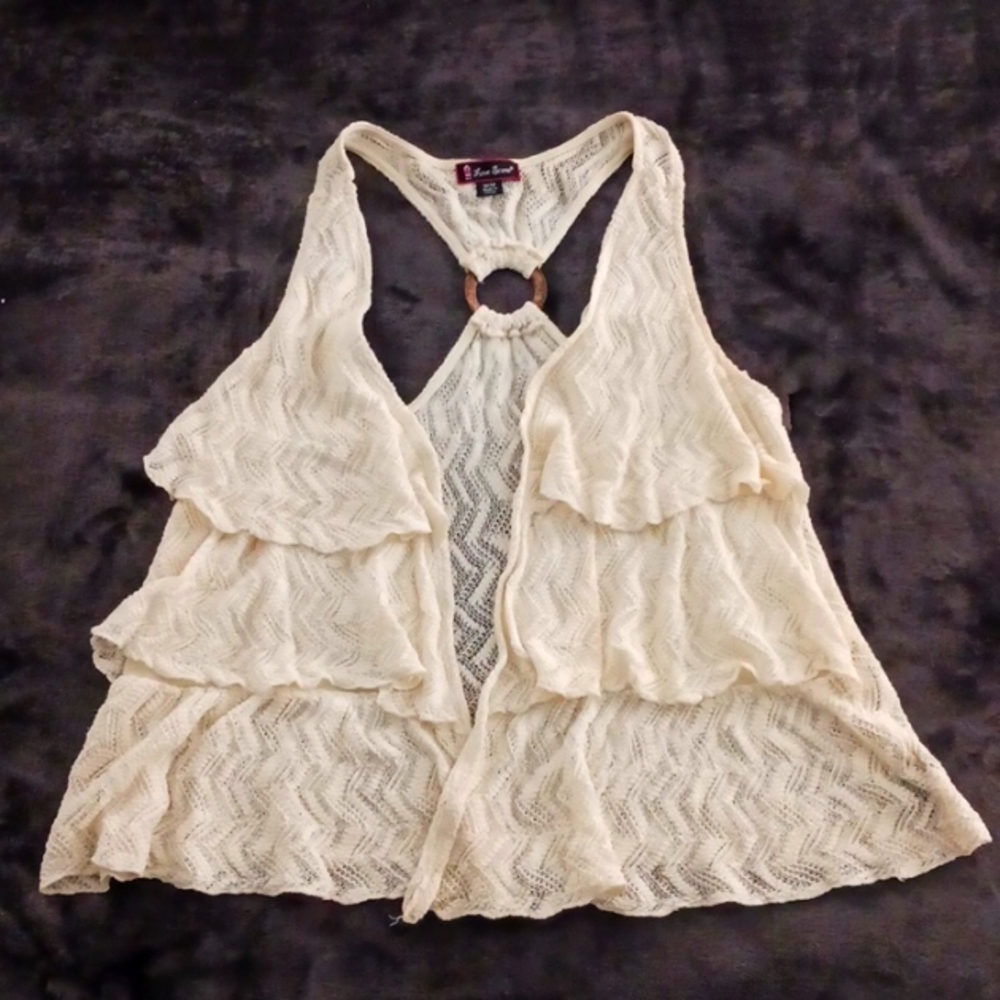 Love Scene lacey sleeveless cover up with wood look ring in the back.  Size M.